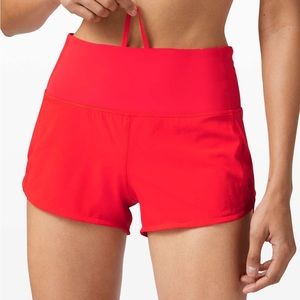 Lululemon carnation red speed ups. 2.5 in low rise